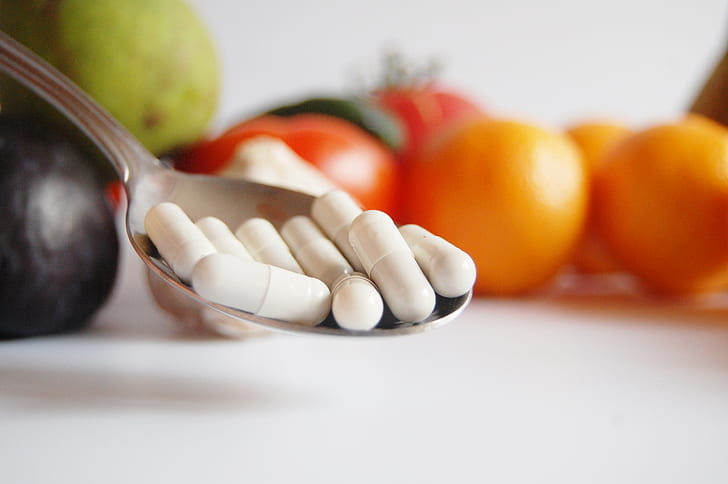 Raw Vegan Supplement and Vegetables